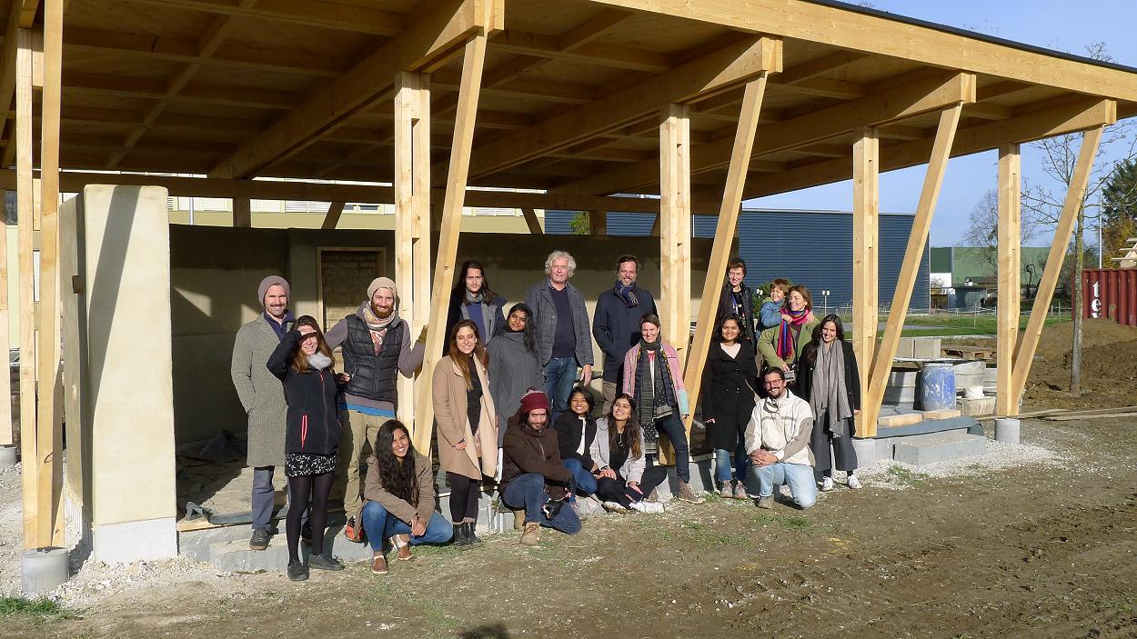 Anna Heringer and Martin Rauch together with the students on site